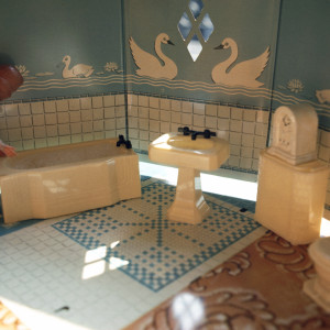 First Bathroom/ Woman Standing Left